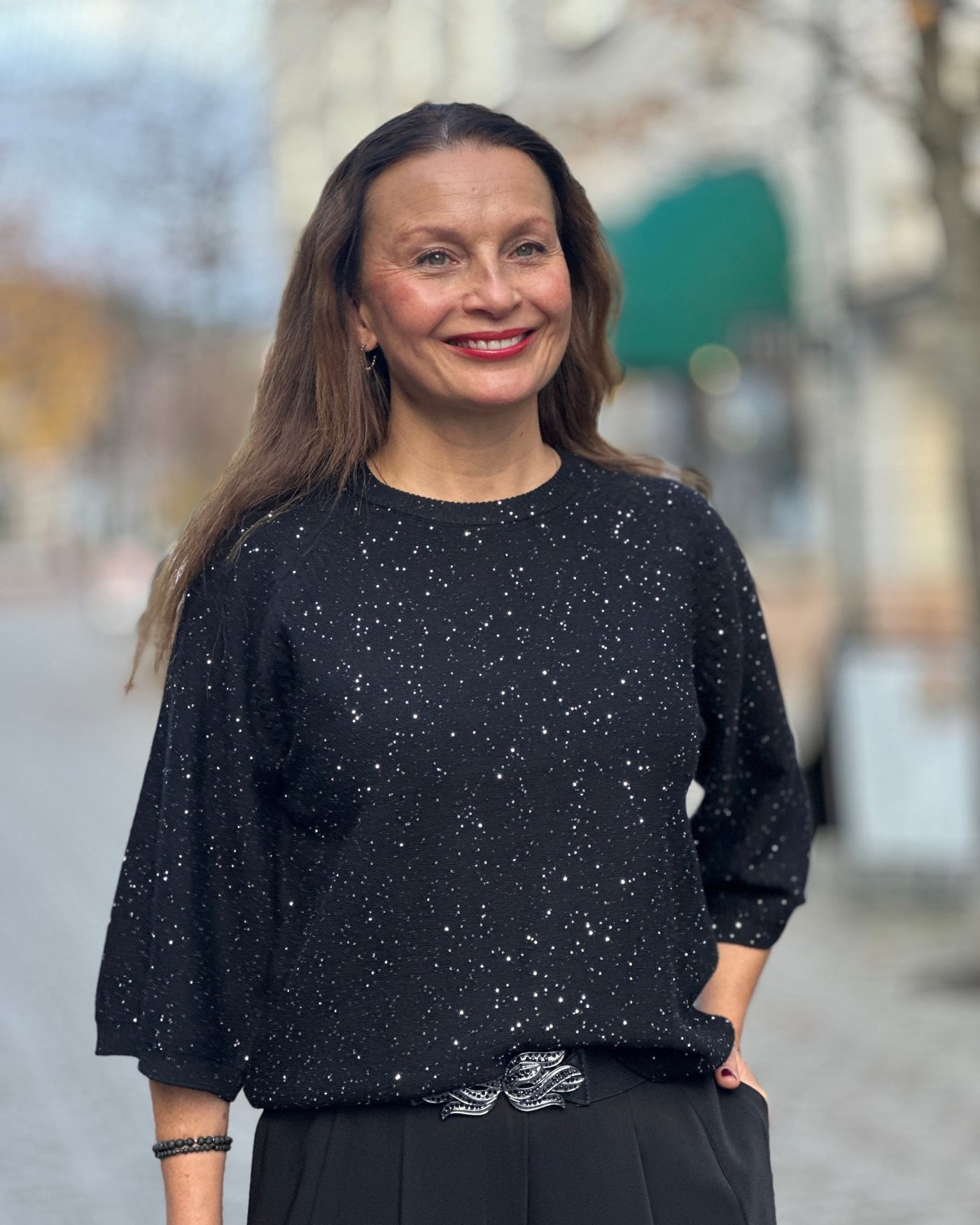 Pullover med paljetter