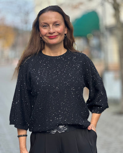 Pullover med paljetter