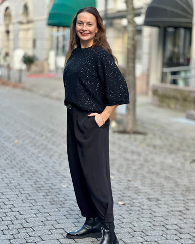 Pullover med paljetter