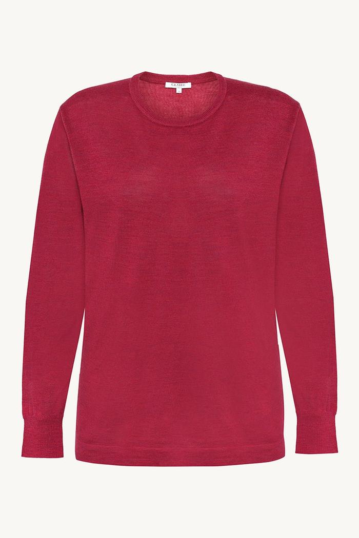 Rød pullover i 100% merinoull med lange ermer og rund hals.