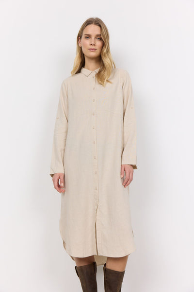 Skjortekjole i beige med klassisk krage, lange ermer og knappestolpe, laget i lin-viskose.