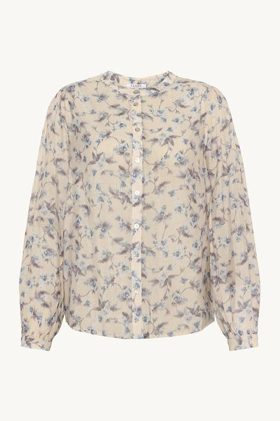 Blomstrete bluse i lyocell med knapper foran, lange ermer og rund hals.