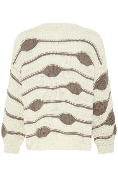 Strikket bluse med bølgete mønster i krem og brun. Rund hals, ribbestrikkede kanter på ermer og nederst.