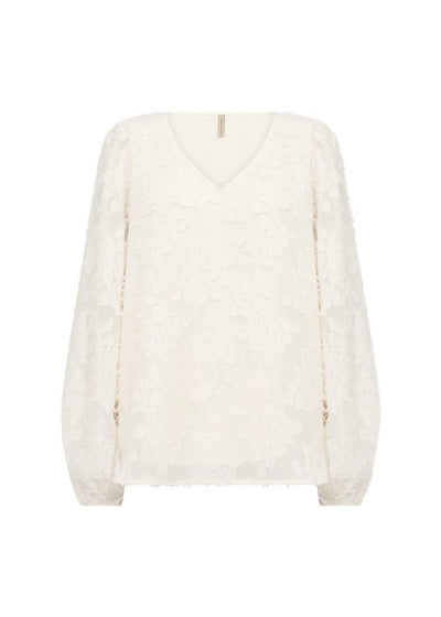 Bluse med blomstrete blonder, voluminøse ermer, elastisk mansjett og V-hals.